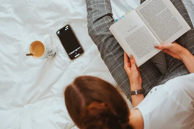 Hotel guest using mobile phone